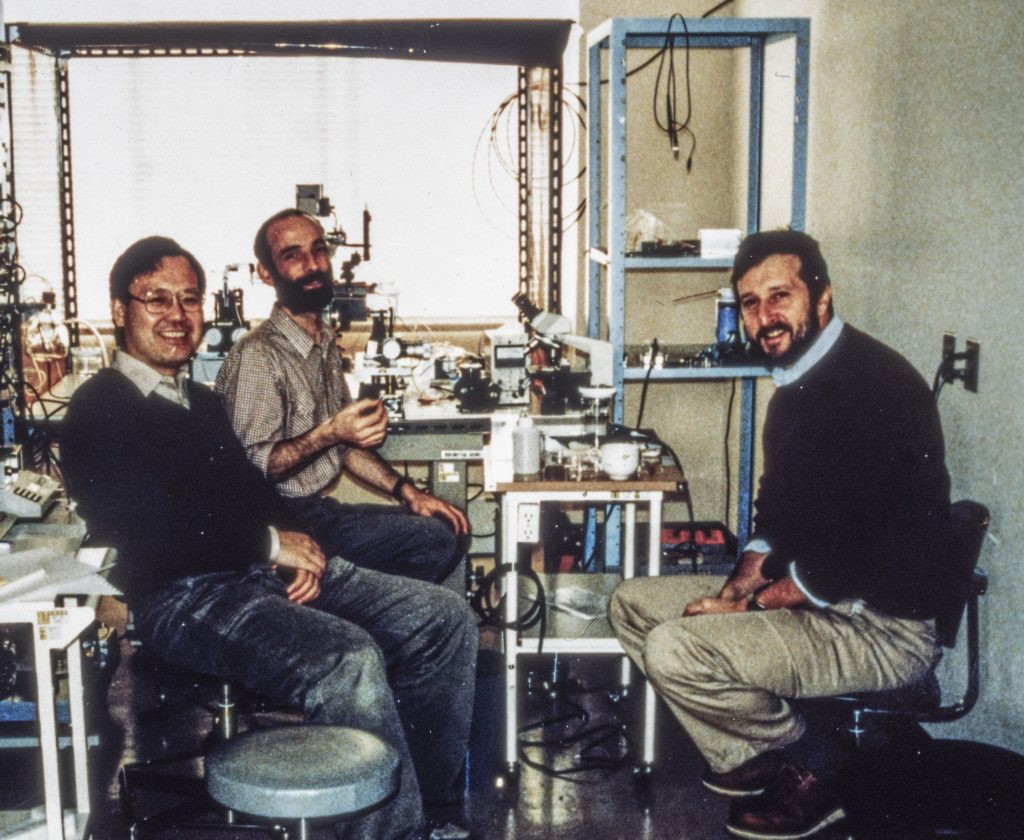 Fred Sachs in lab with colleagues